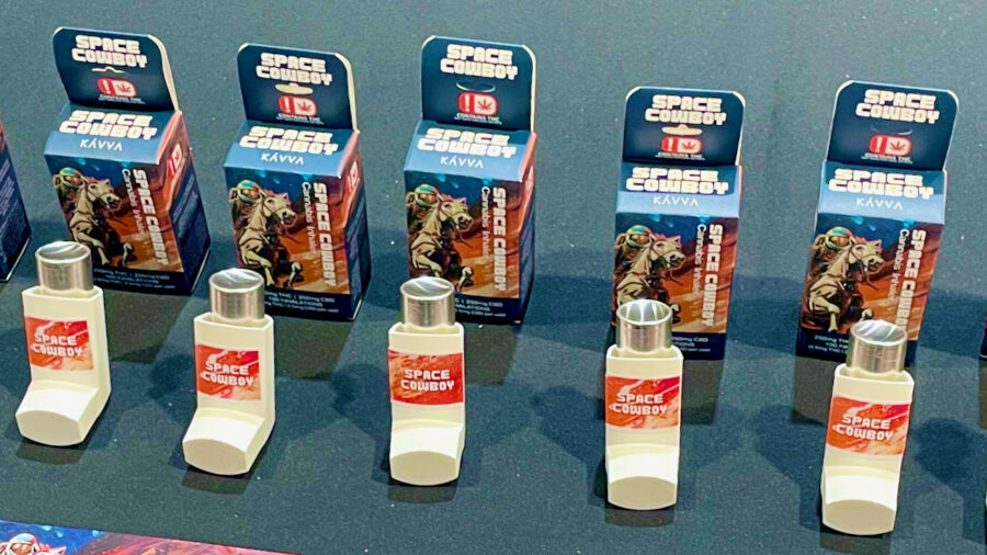 Image of Space Cowboy inhalers lined up in front of their packaging on a table top