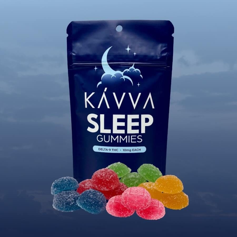 sleep-kavva-delta-9-thc-gummies-pile-in-front-packaging-sunset-behind-packaging-kavva-2023